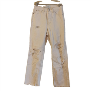 BDG cream colored distressed cowboy jeans. Size 28. Couple stains in back.